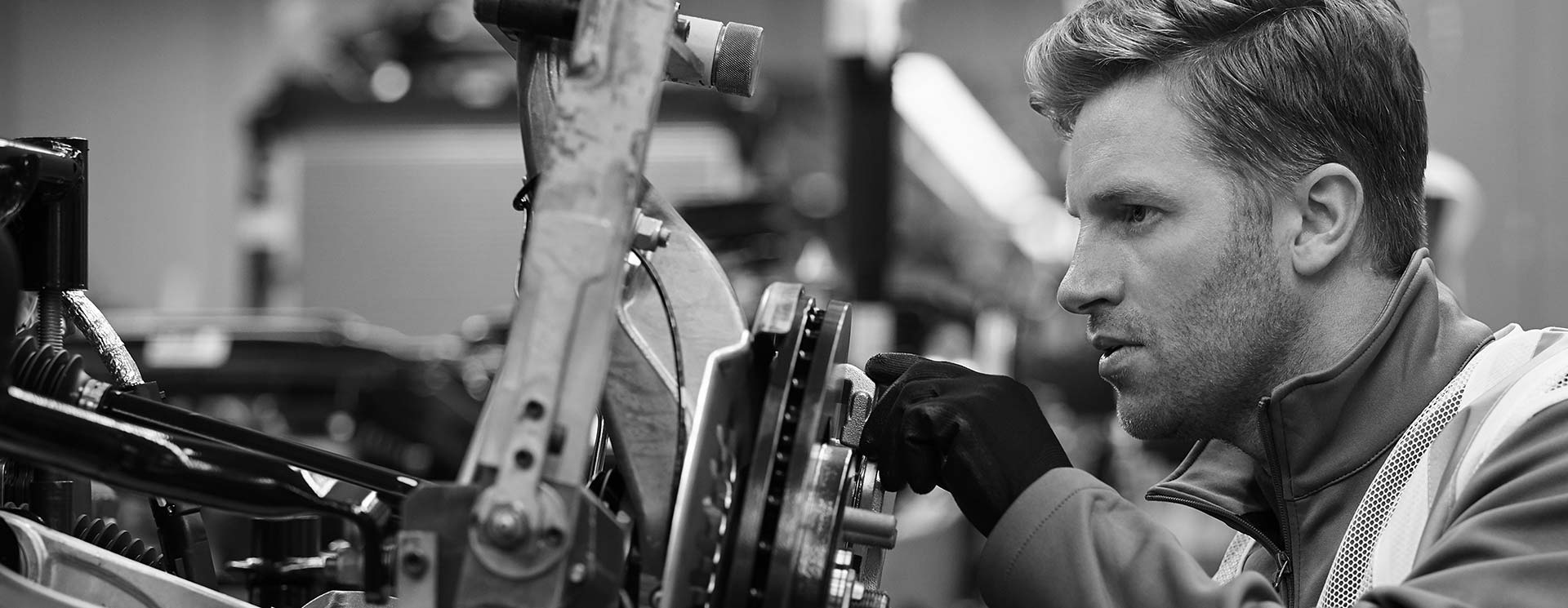 Man working on complex machinery